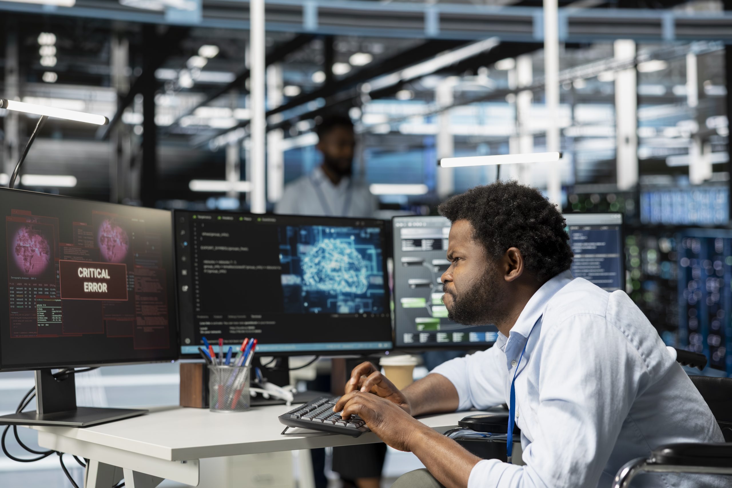 Engineer setting up AI data center equipment upset by critical error message Engineer setting up AI data center equipment upset by critical error message